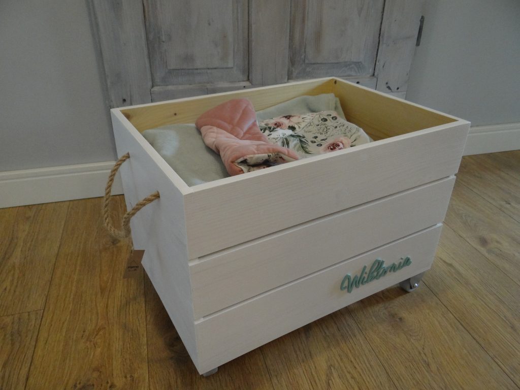 Wooden toy box on wheels