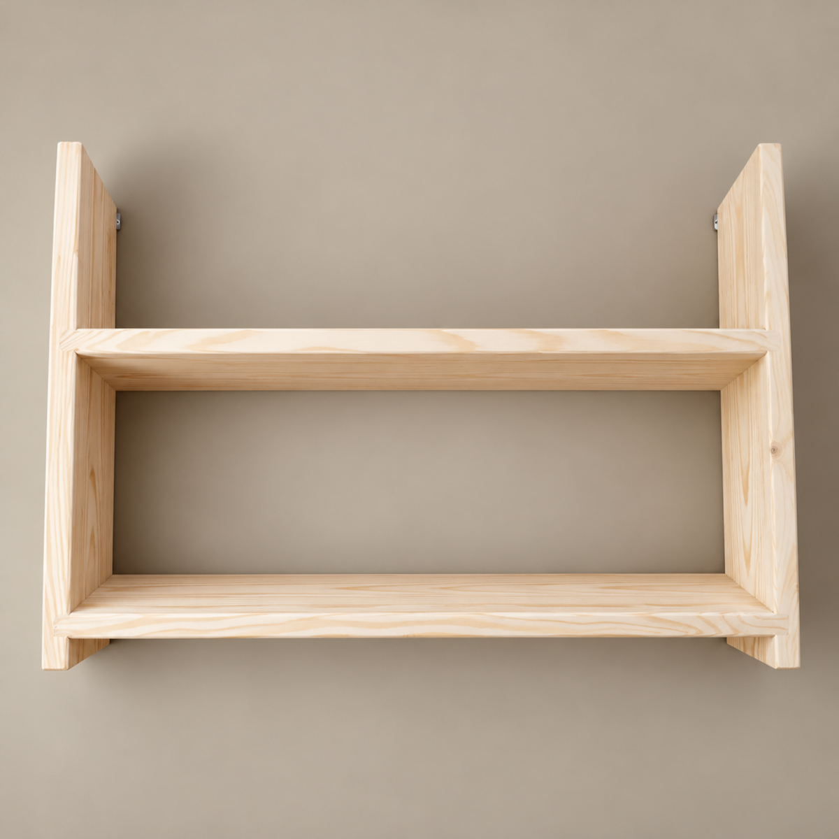 A minimalist two-tier wooden wall shelf made of light natural pine wood, shown against a solid warm gray background.