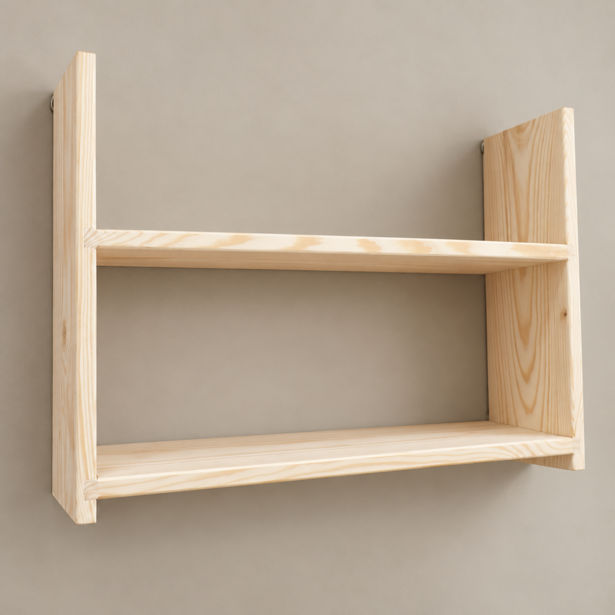 A two-tier wooden wall shelf made of light natural pine wood, mounted on a plain neutral gray wall.