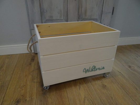Wooden toy box on wheels