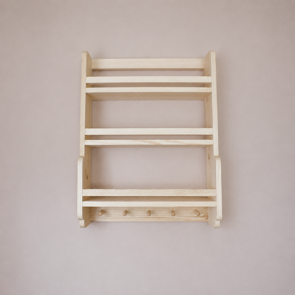 Wooden wall shelf with multiple shelves and hooks on a plain wall.