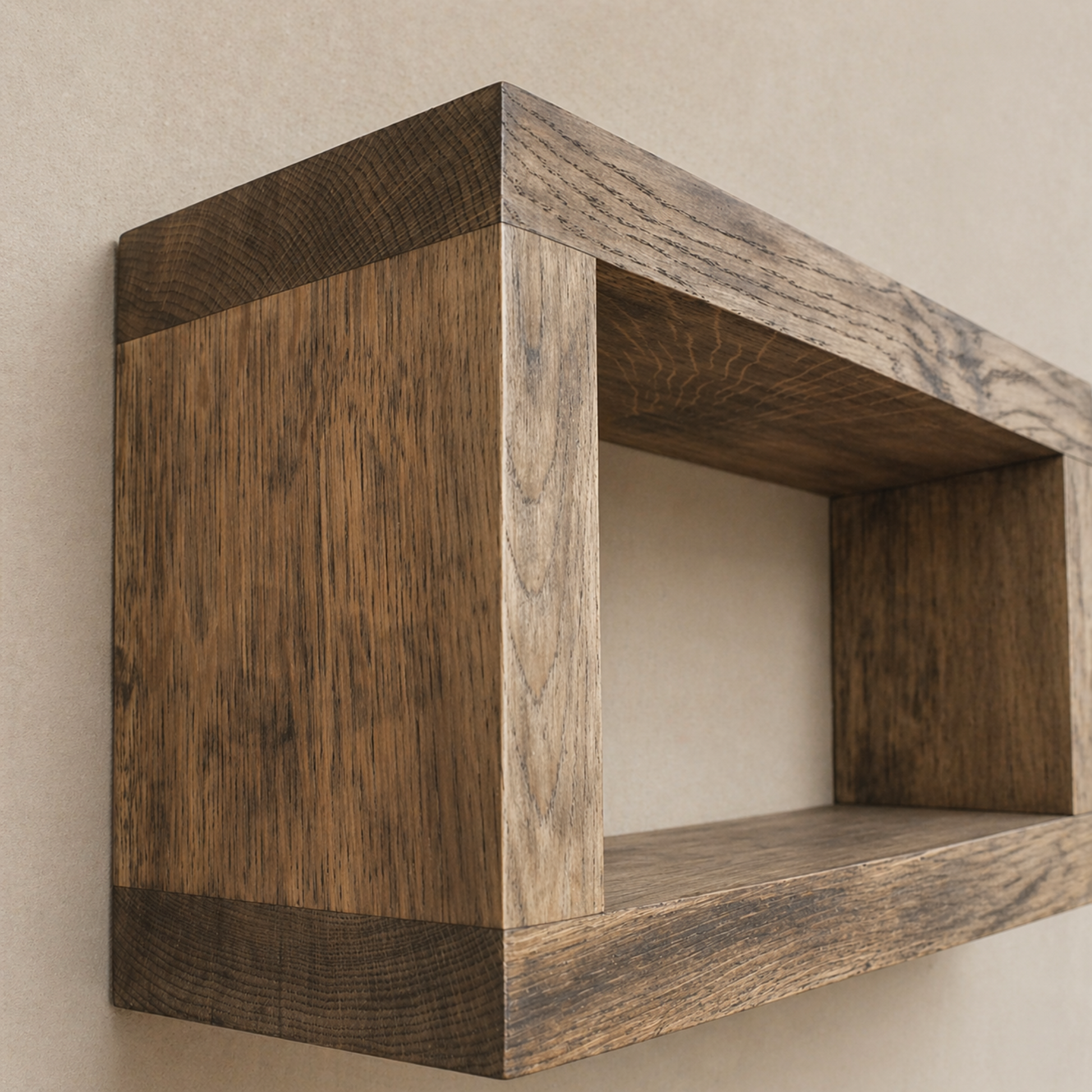 Wooden shelf mounted on a beige wall