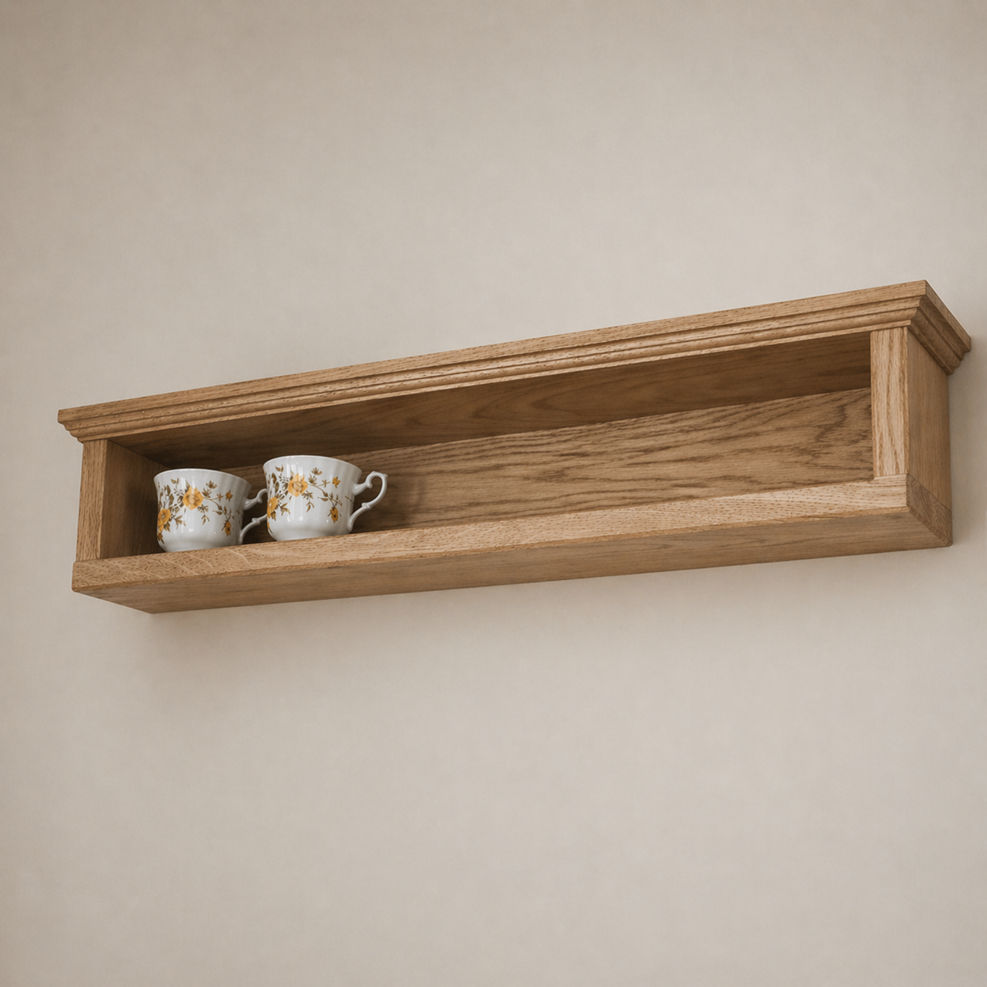 Wooden shelf with two decorative cups on a plain wall