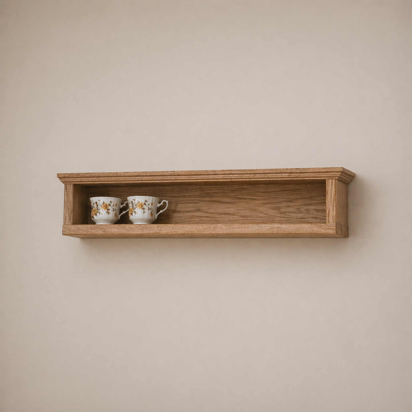 Wooden shelf with two ceramic cups on a beige wall