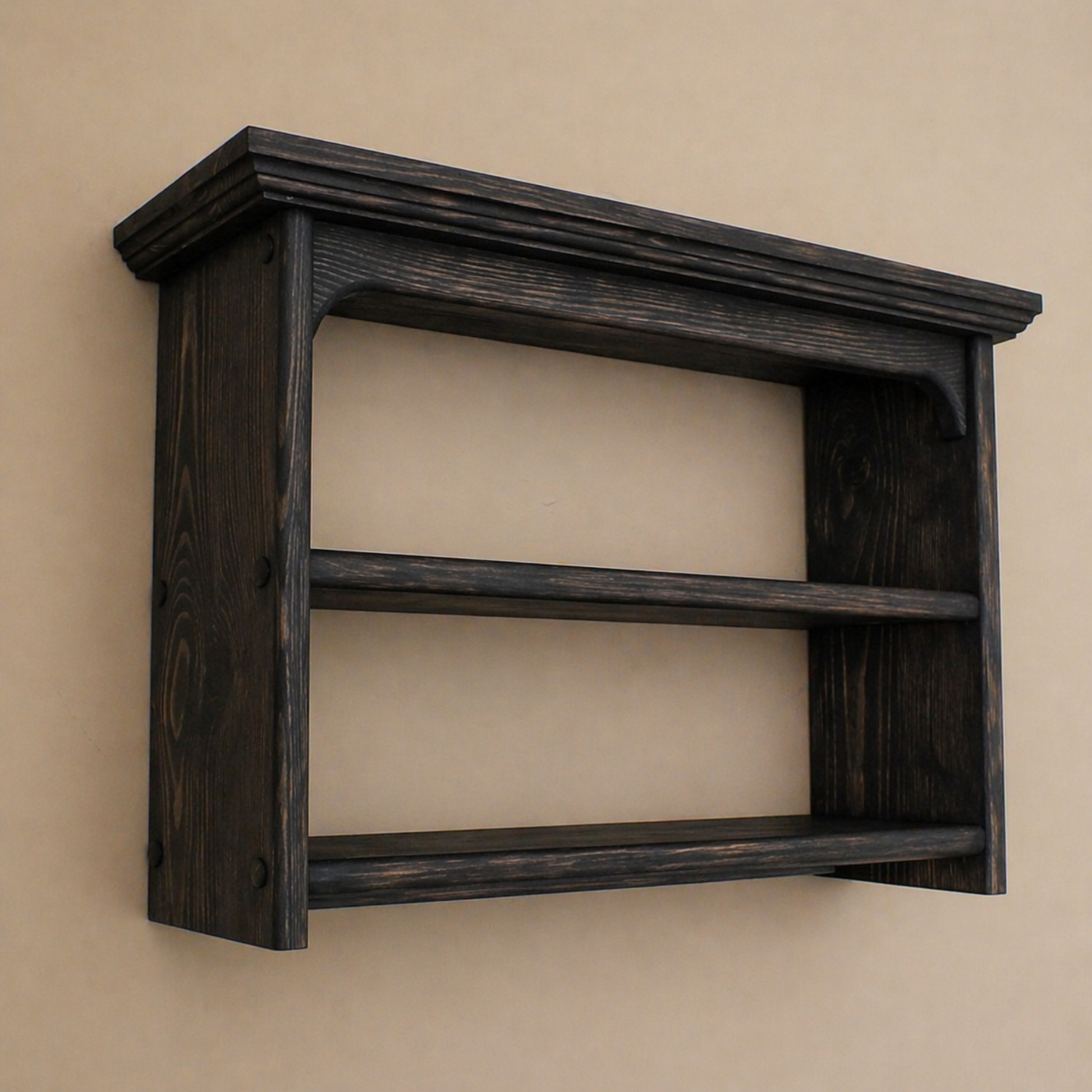 Dark wooden shelf mounted on a beige wall