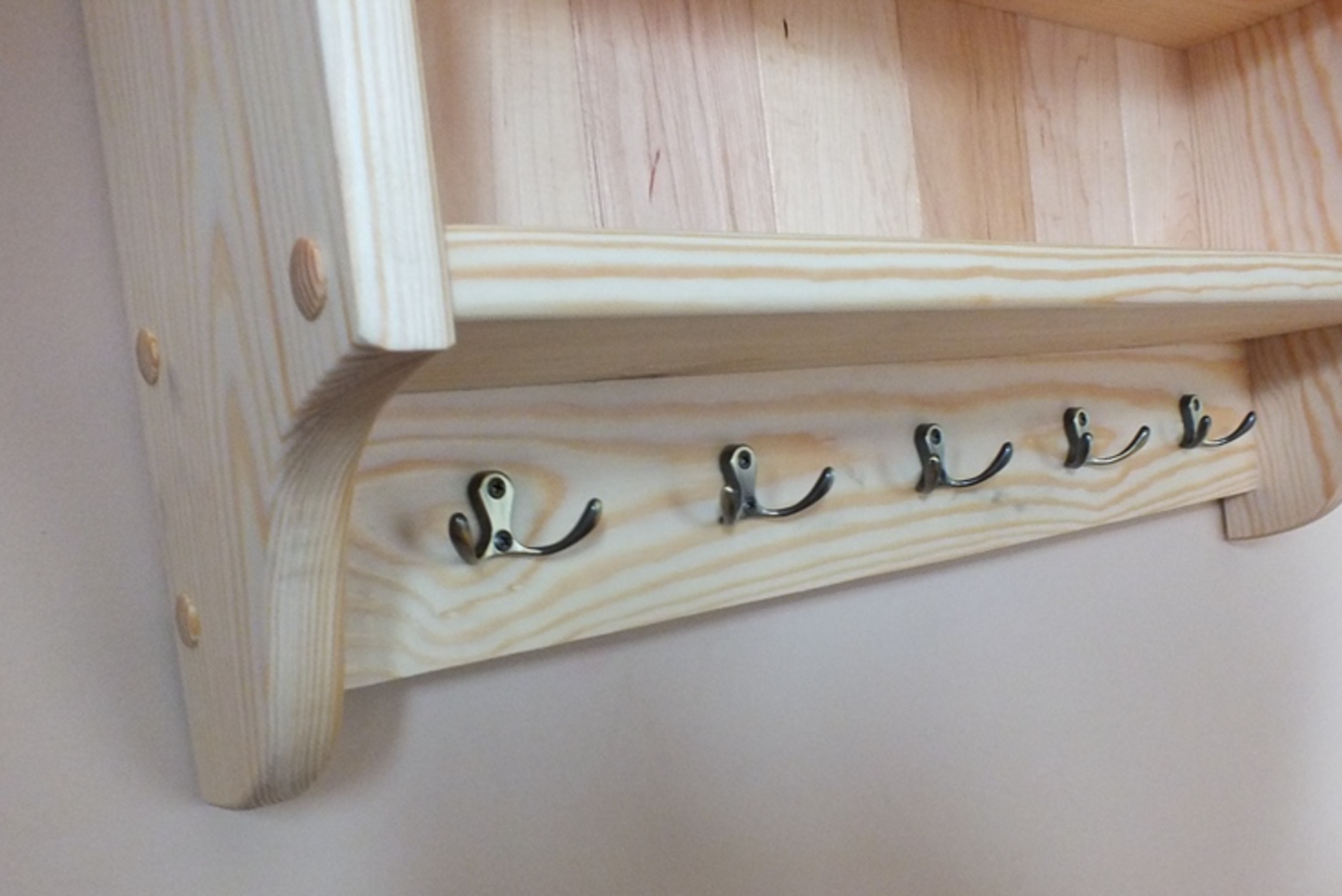 s91 Wall mounted kitchen open shelving with decorative top panel and hooks on the bottom panel