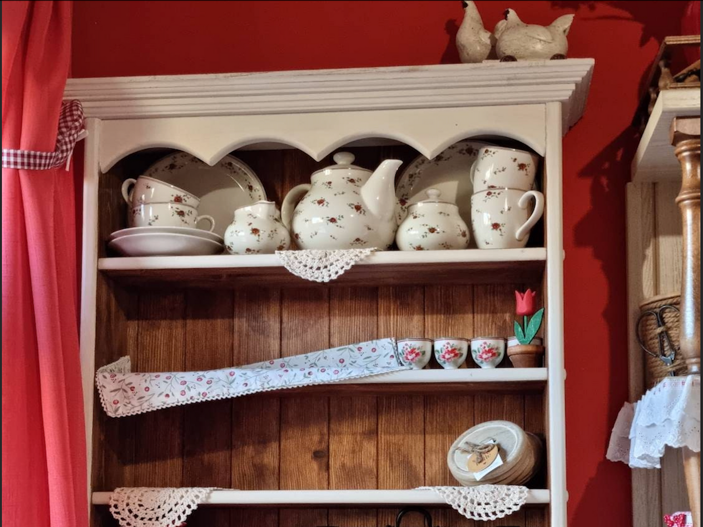 s91 Wall mounted kitchen open shelving with decorative top panel and hooks on the bottom panel