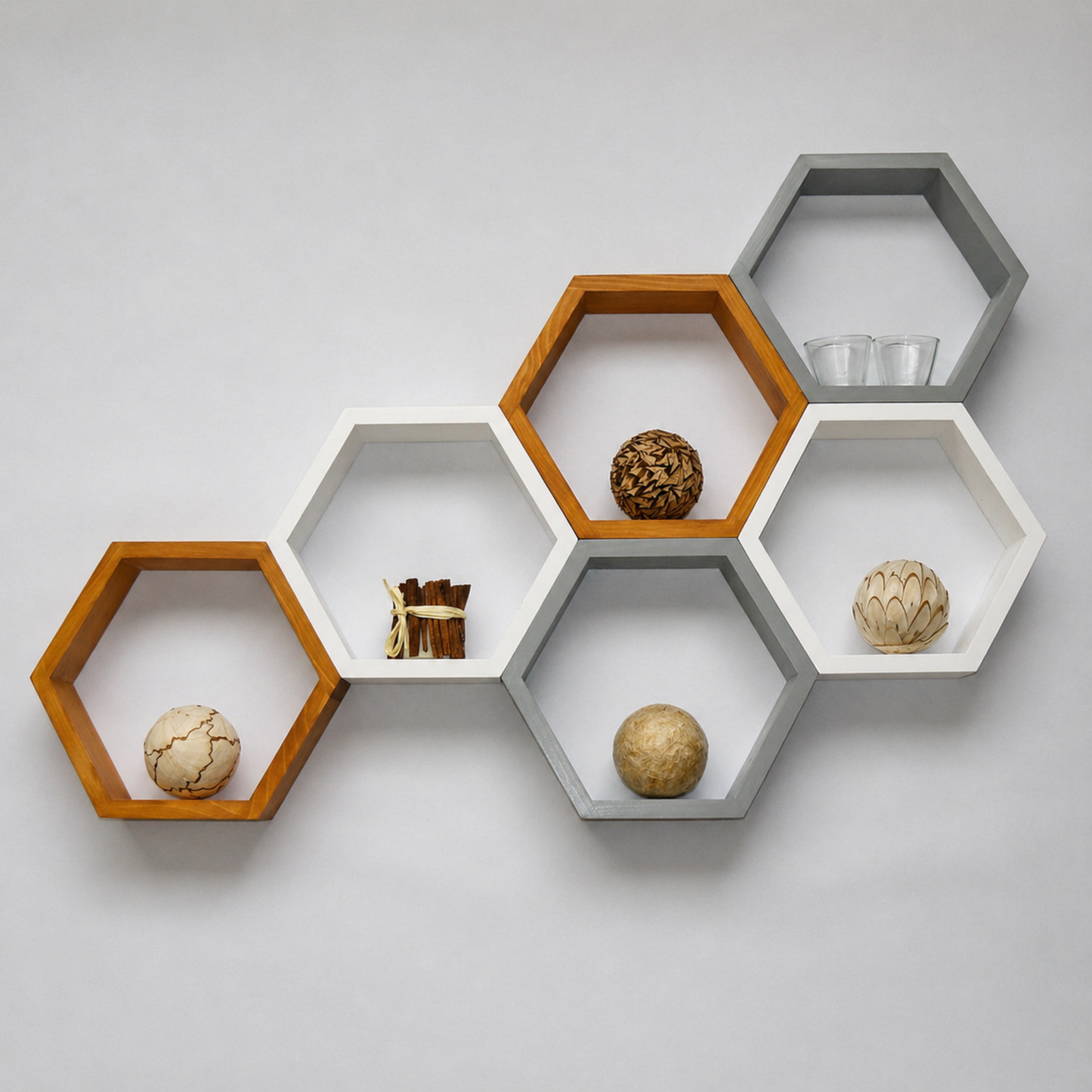 Hexagonal shelves in white and brown on a gray background