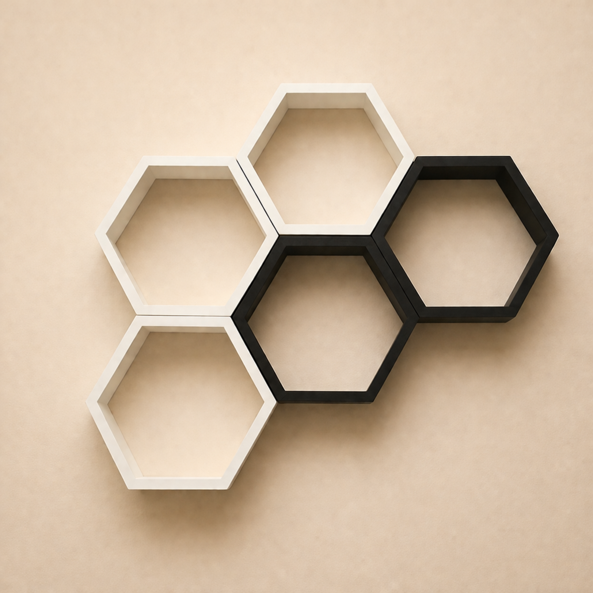 Hexagonal wall shelves in black and white on a beige wall