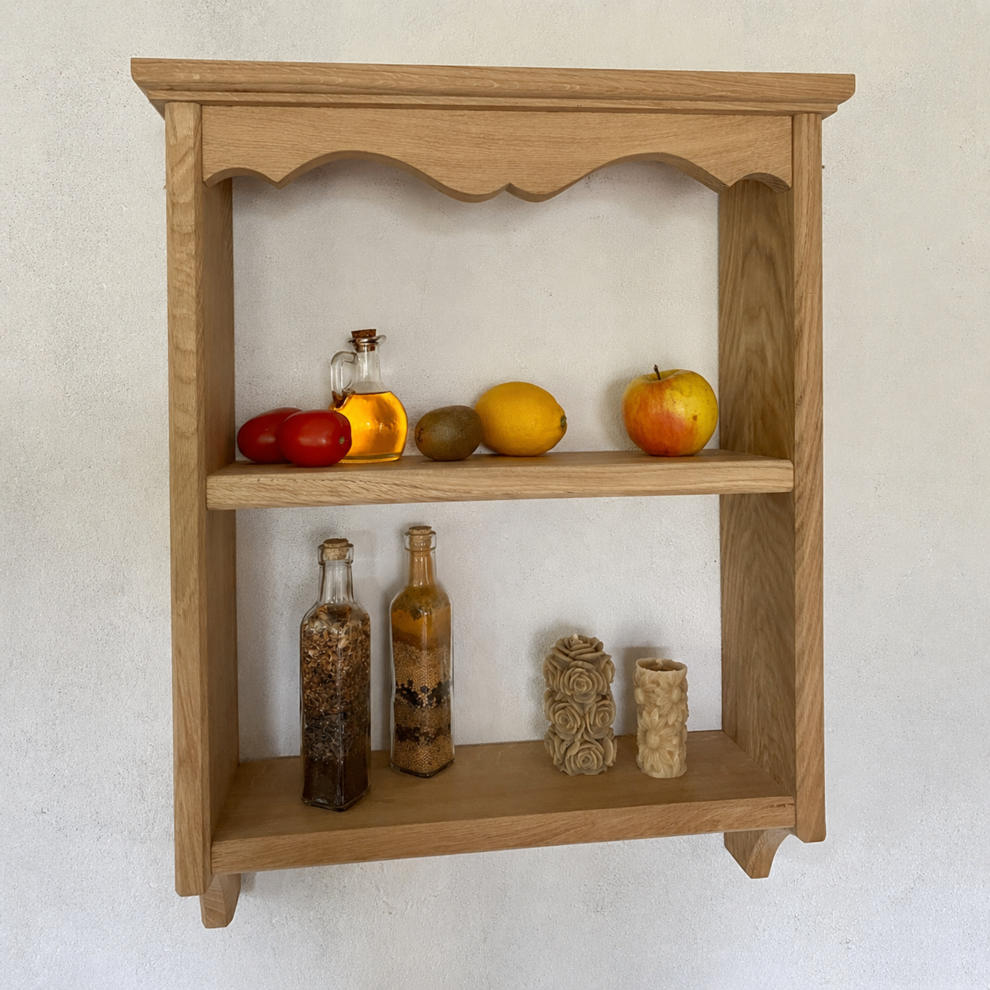 Wooden shelf with decorative items against a white wall