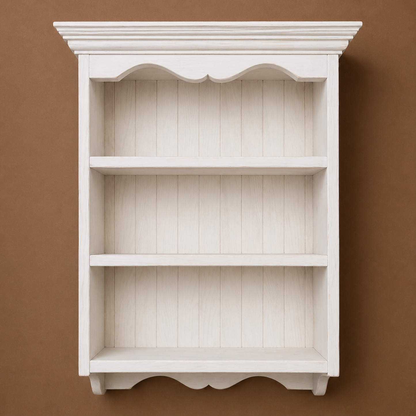 White wooden bookshelf against a brown background