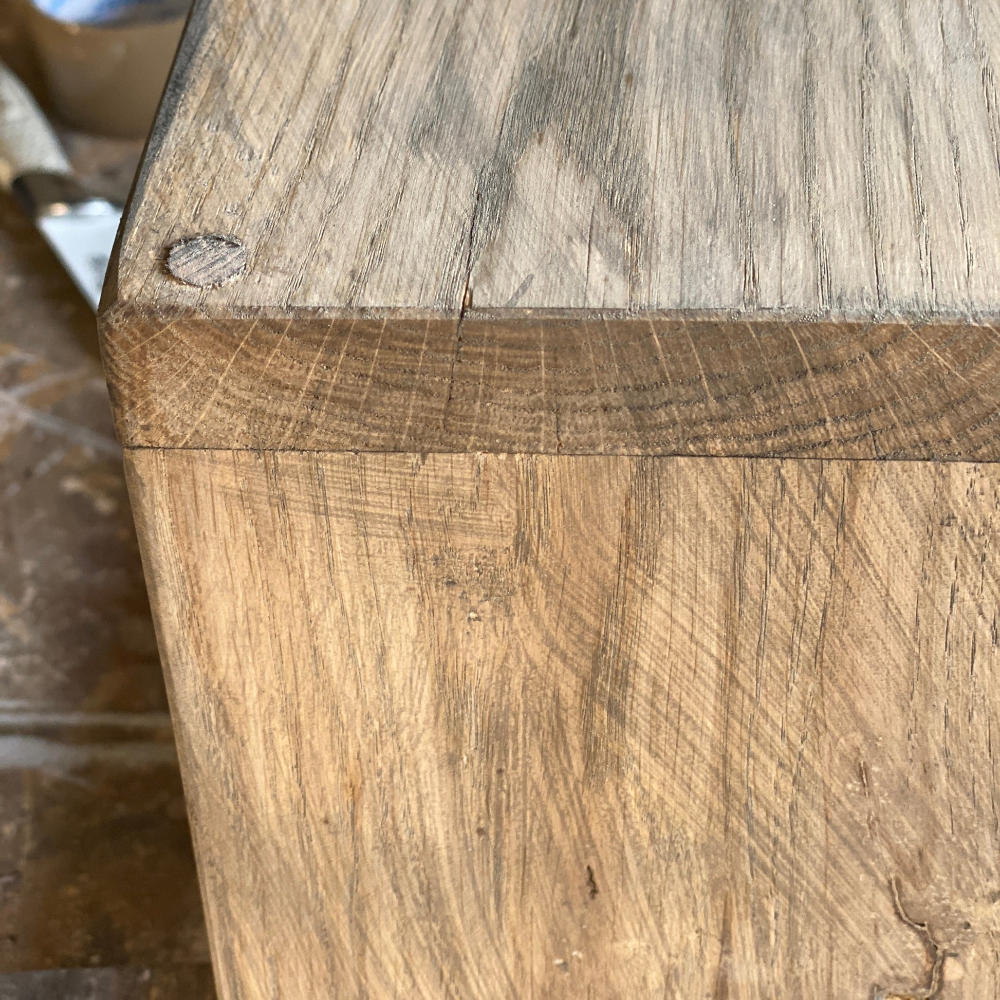 Close-up of a wooden surface with visible grain and texture