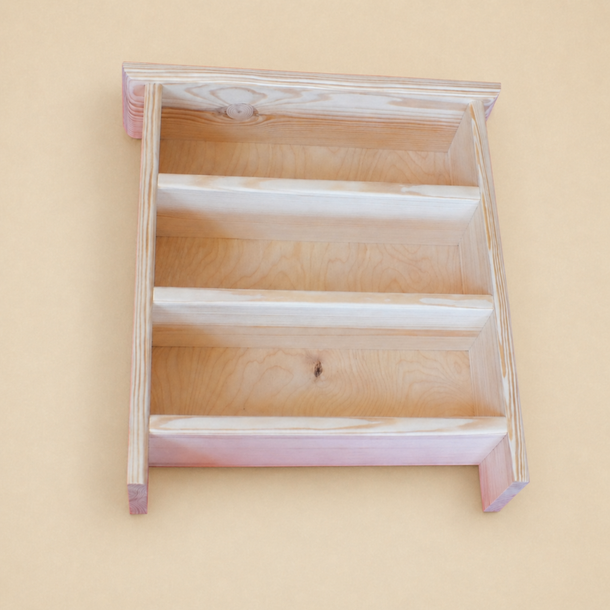 Wooden pet ramp on a beige background