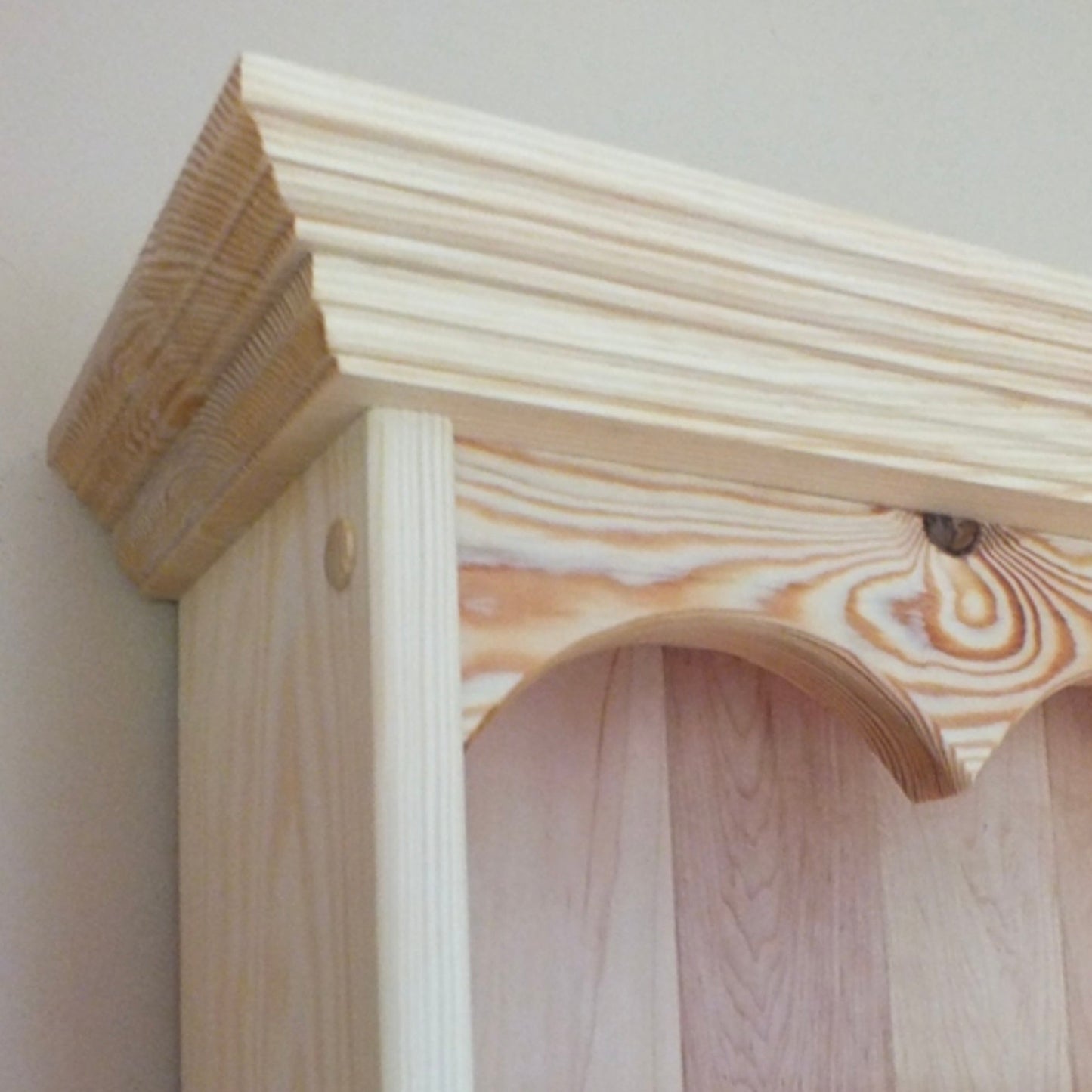 Wooden shelf with a plain background