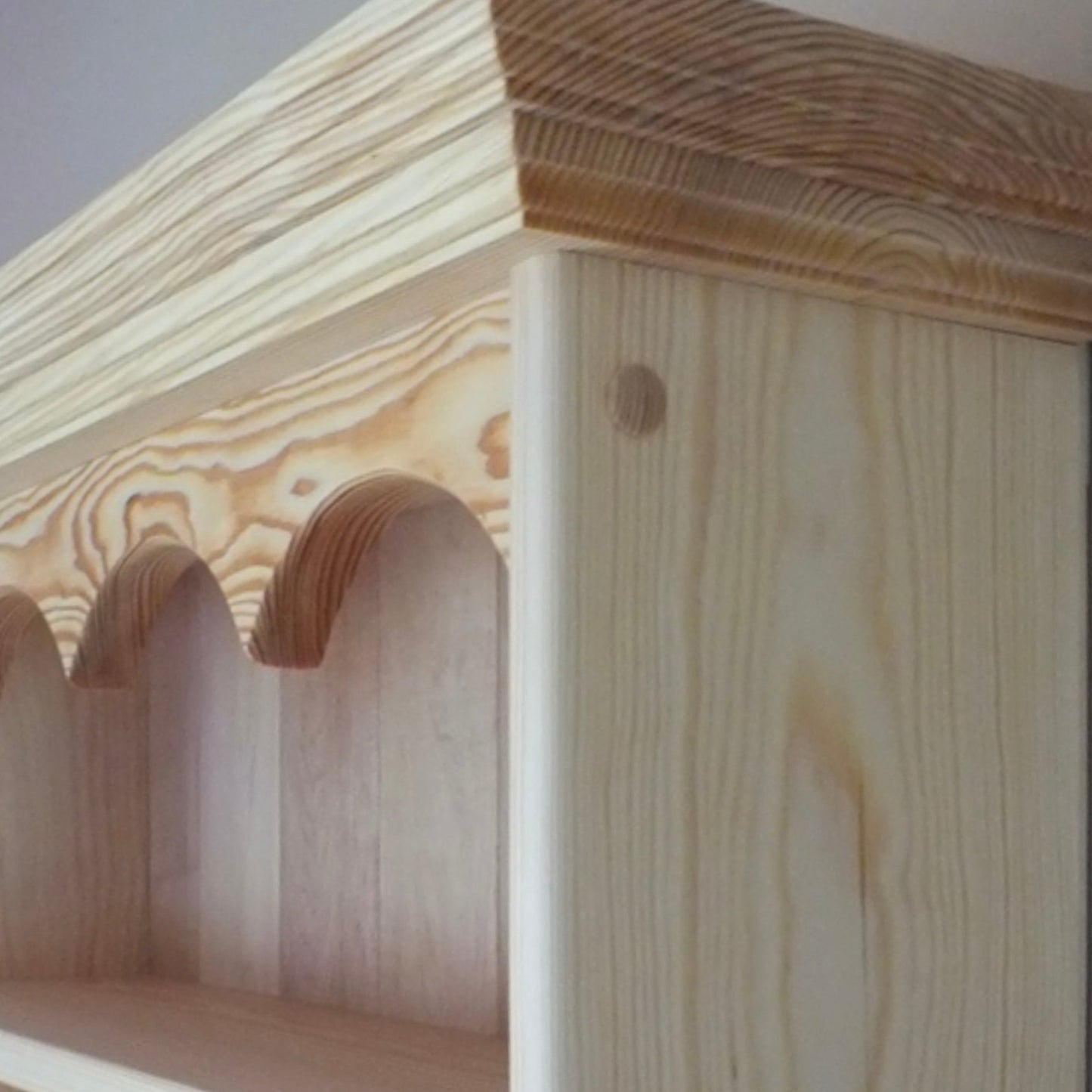Wooden shelf with a light finish